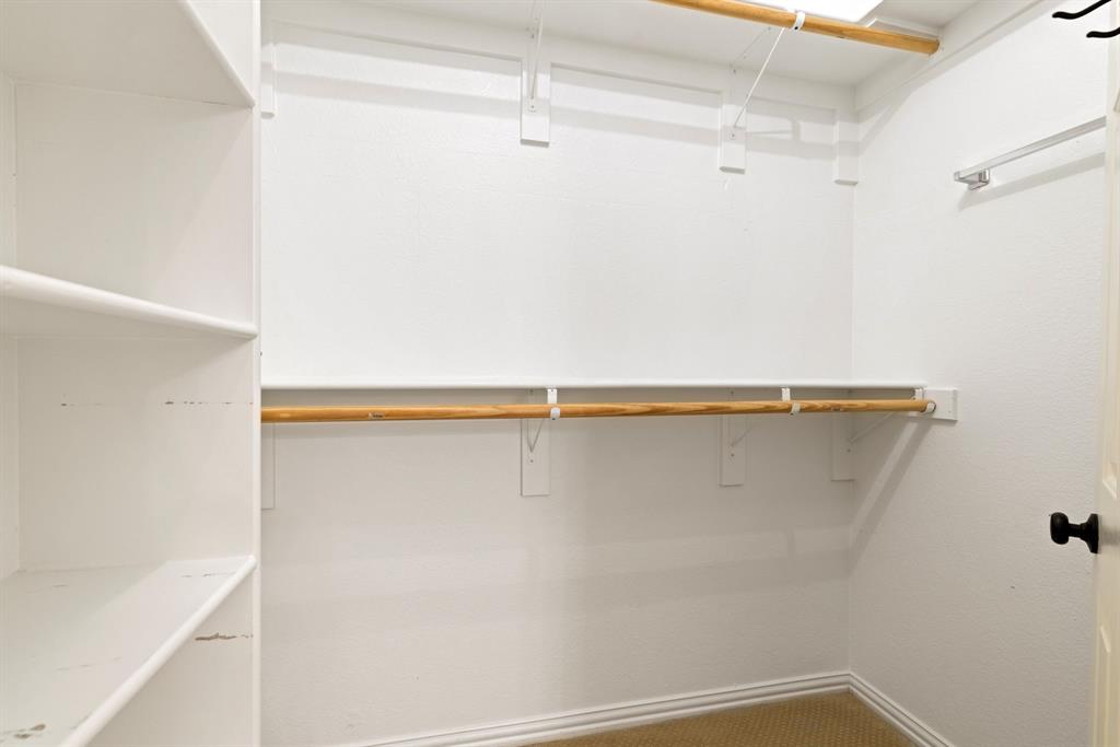 2021 Country Brook Lane Allen, TX 75002 - Photo 24 of 40 a view of a room with racks on the wall