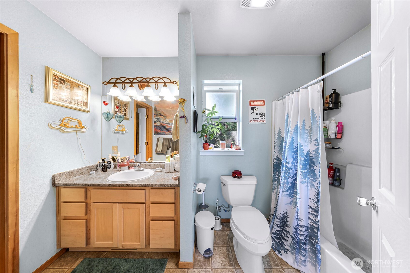 1121 22nd Street Bellingham, WA 98225 - Photo 15 of 34 a bathroom with a sink toilet and shower