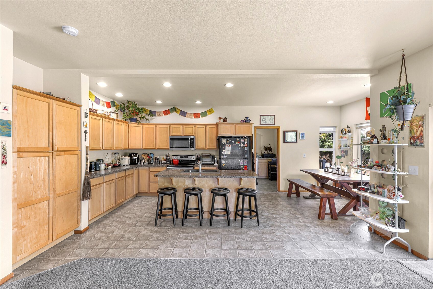 1121 22nd Street Bellingham, WA 98225 - Photo 3 of 34 a kitchen with lots of counter top space and appliances