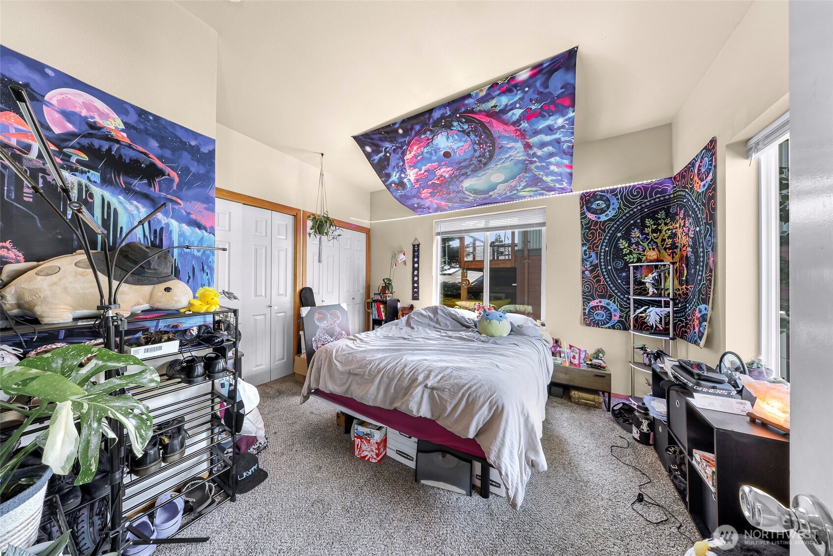 1121 22nd Street Bellingham, WA 98225 - Photo 10 of 34 a bedroom with bed and a flat tv screen