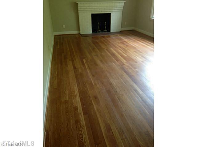 Den/Family/Great Room. Living Room with Hardwood Floors and fireplace