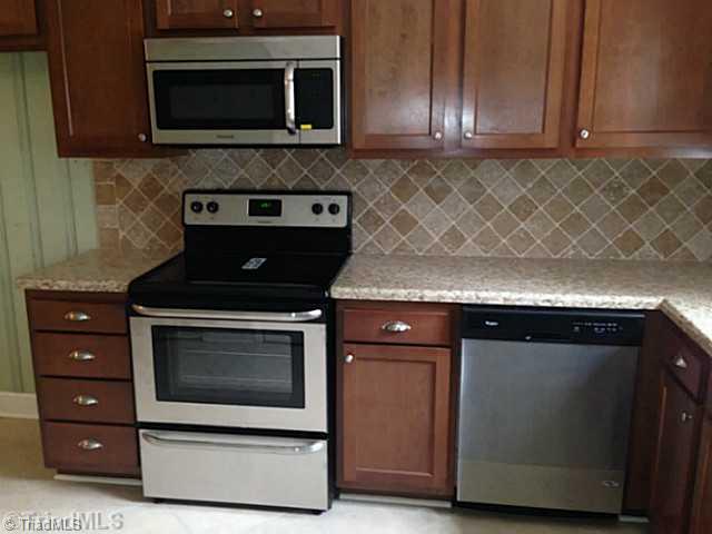 Cafeteria/Kitchen. New Kitchen Cabinets stainless steel appliances, new countertops and tile backsplash