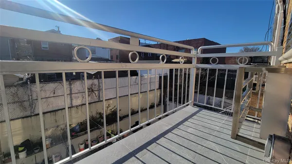 a view of a large building with wooden floor