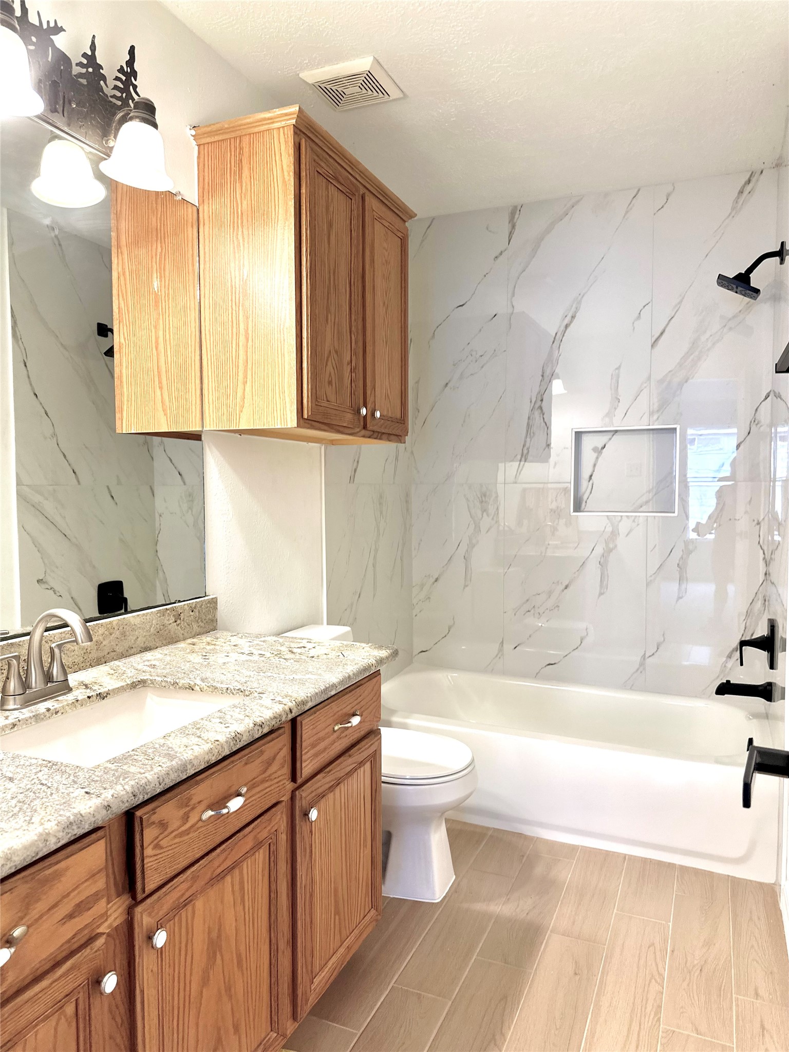 24914 Aughton Court Spring, TX 77389 - Photo 5 of 27 Freshly renovated secondary bathroom