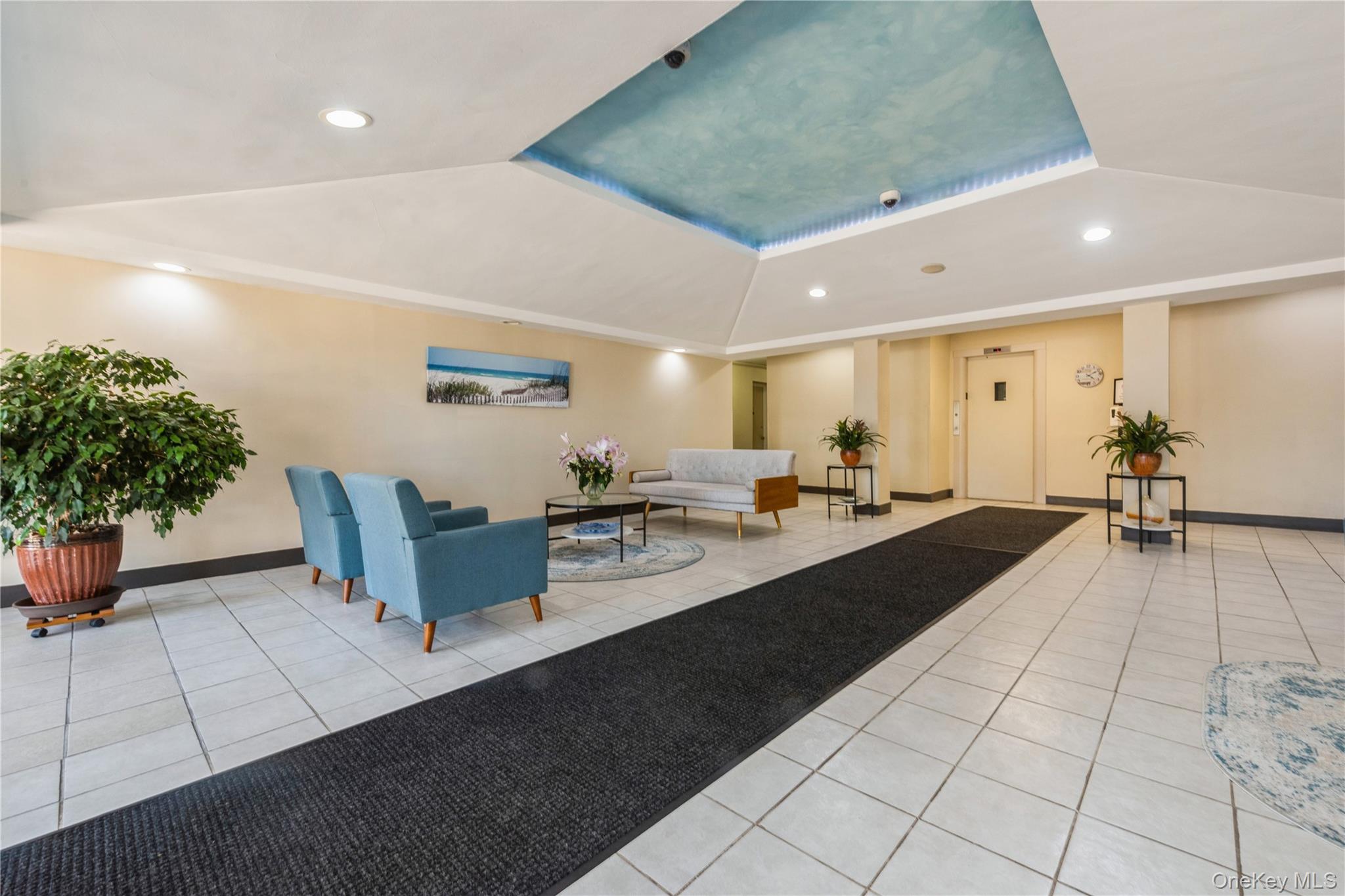 855 East Broadway, Unit LD Long Beach, NY 11561 - Photo 6 of 9 a living room with furniture