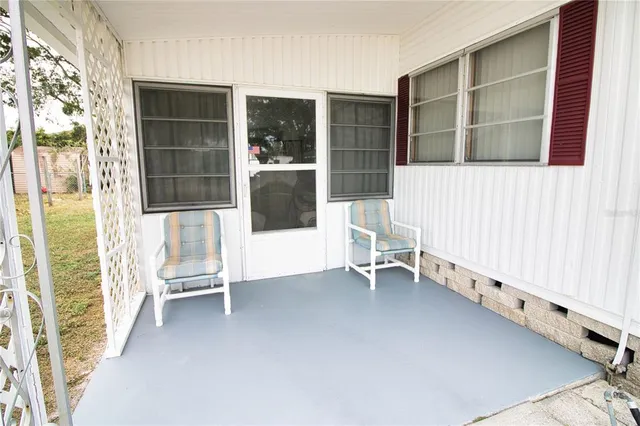 a view of an empty room with a balcony