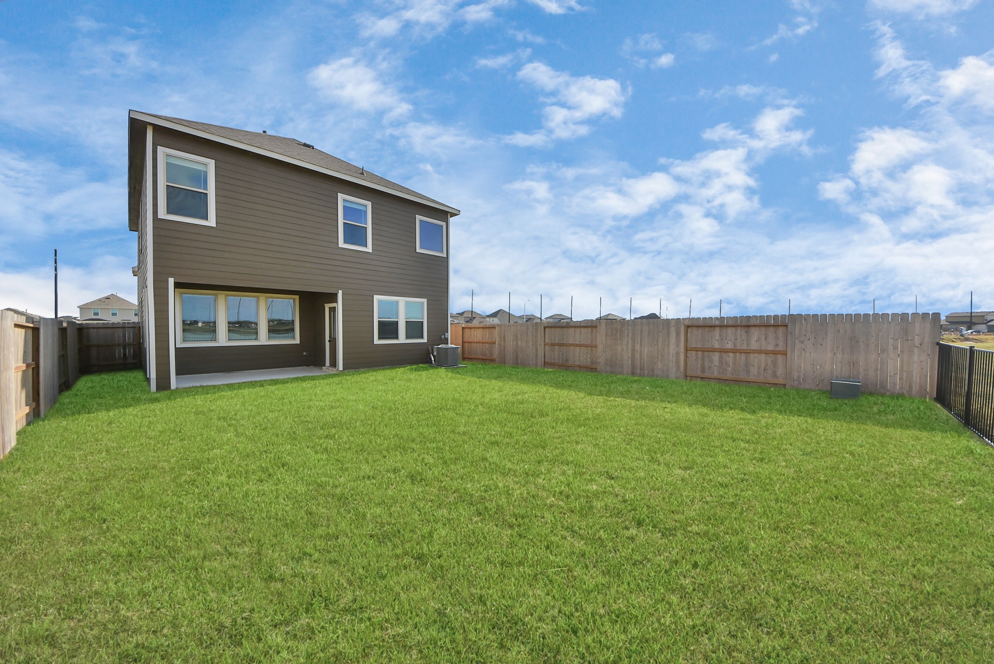 6522 Escondido Drive Rosharon, TX 77583 - Photo 29 of 33 Fully fenced back yard with patio, lake view, no back neighbors