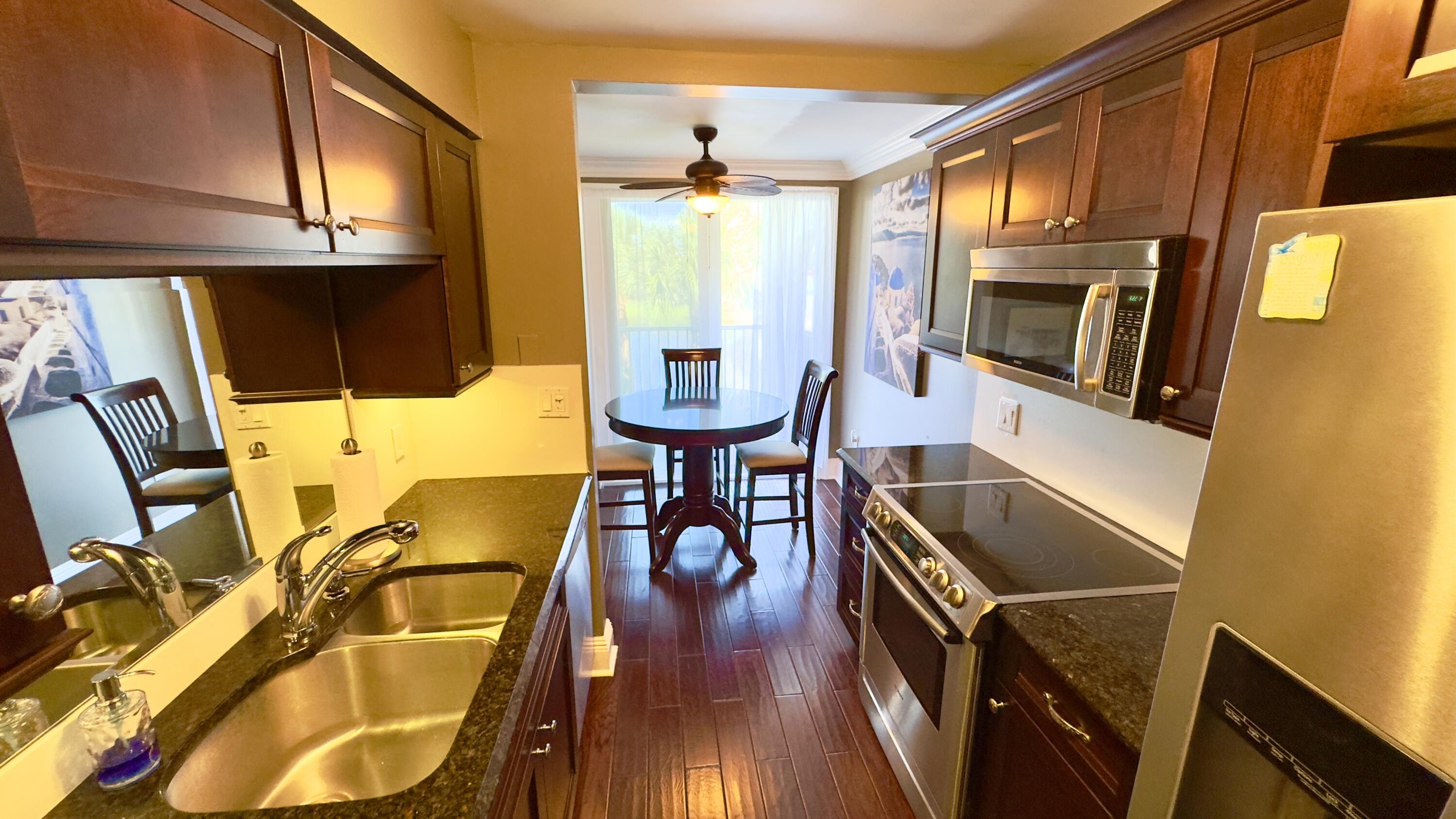 102 Half Moon Circle, Unit F2 Hypoluxo, FL 33462 - Photo 2 of 47 Modern Kitchen