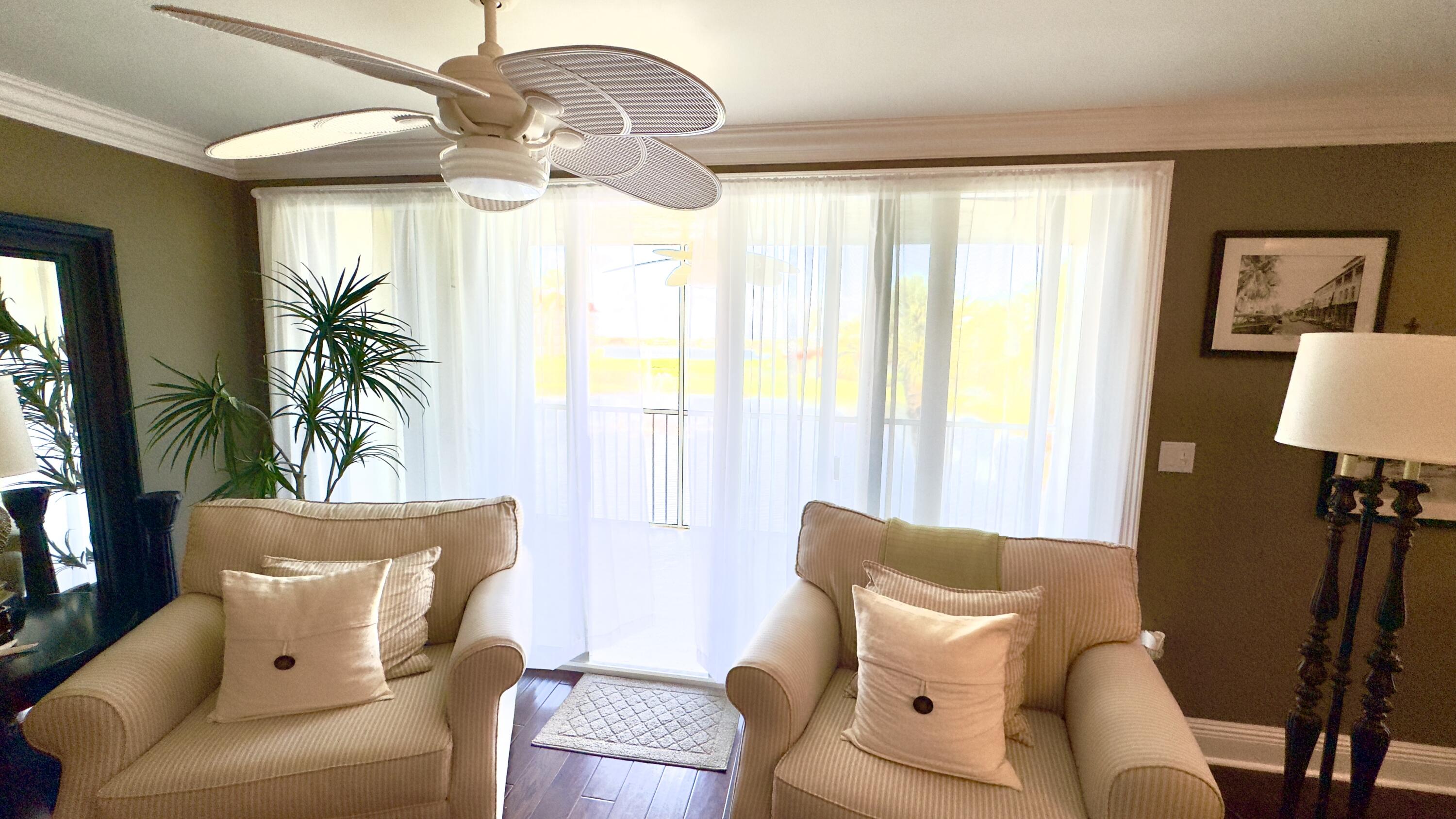 102 Half Moon Circle, Unit F2 Hypoluxo, FL 33462 - Photo 30 of 47 Sliding doors to the large patio