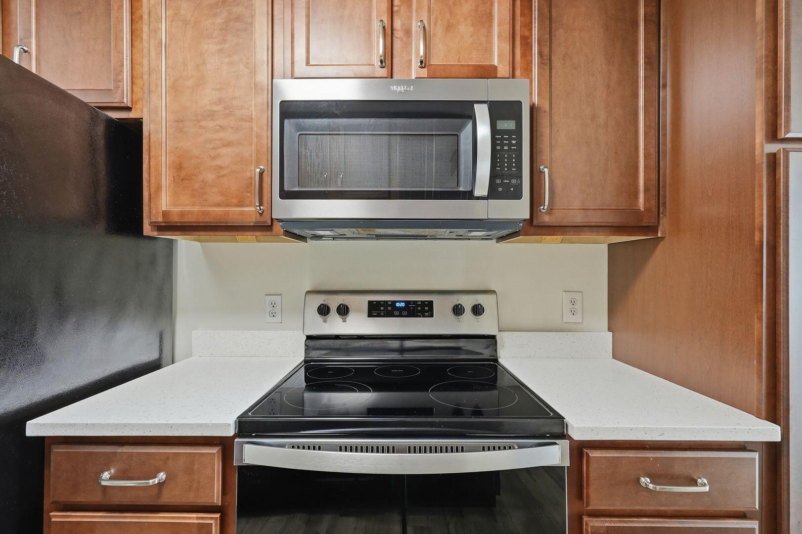5 Kelly Way Valparaiso, FL 32580 - Photo 15 of 31 a kitchen with a stove and a microwave