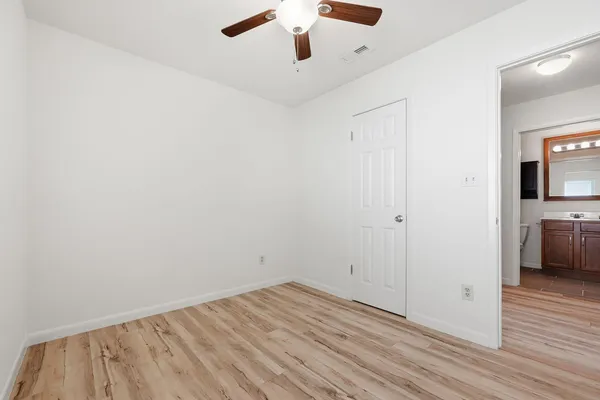 a view of a livingroom with wooden floor