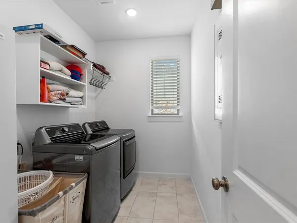 a room with storage and utility