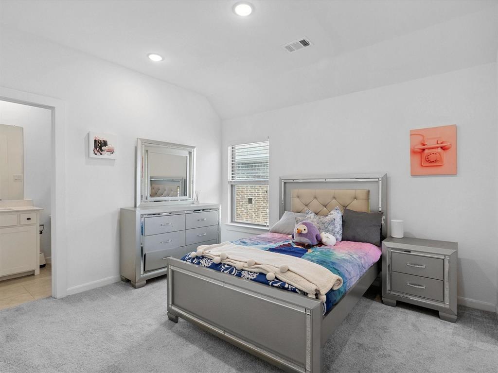 4828 Celestial Road McKinney, TX 75071 - Photo 17 of 25 a living room with furniture and a table