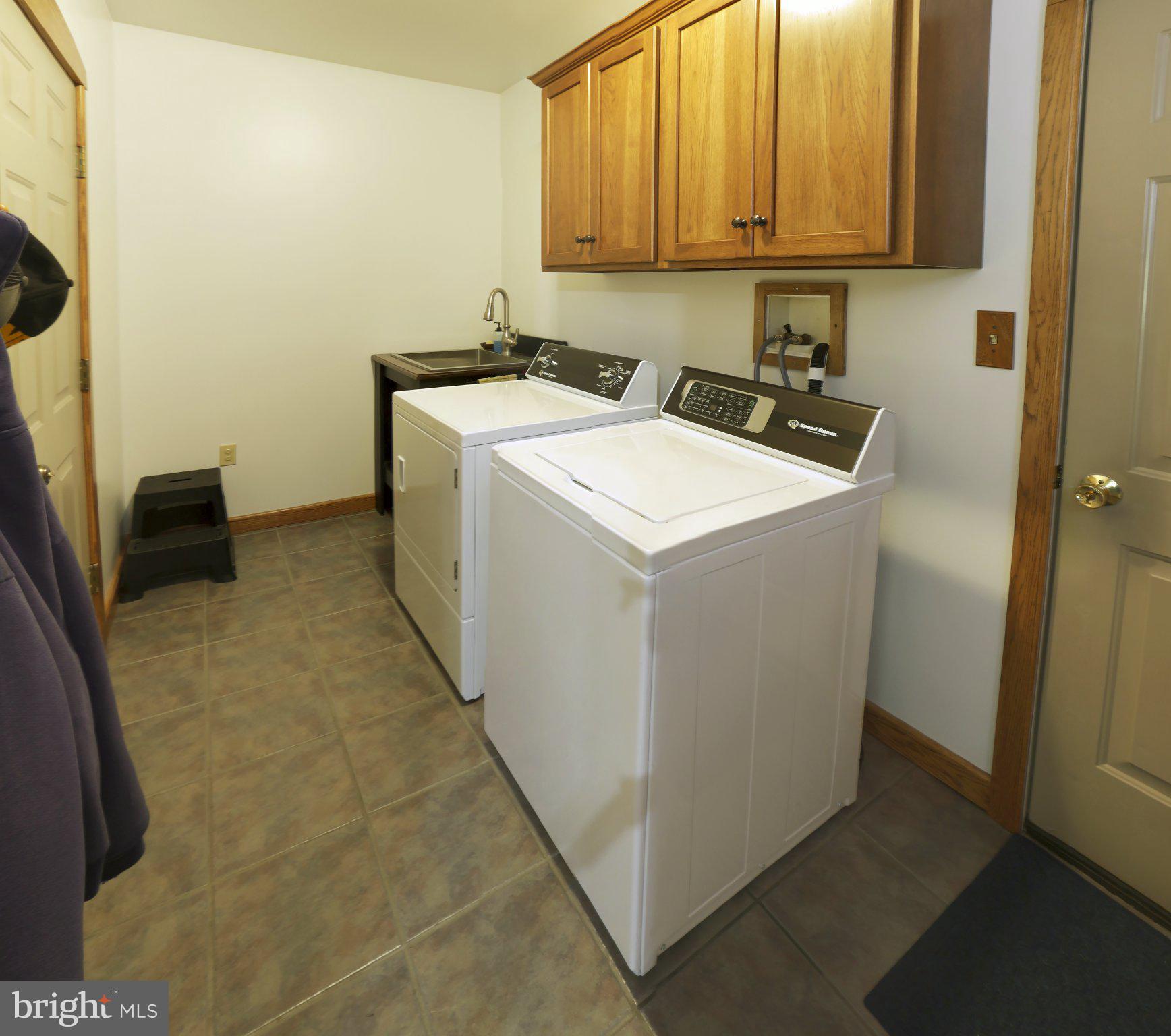 1580 Girl Scout Road Denver, PA 17517 - Photo 28 of 47 Functional laundry space with storage.