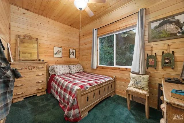 a bathroom with a shower sink and mirror