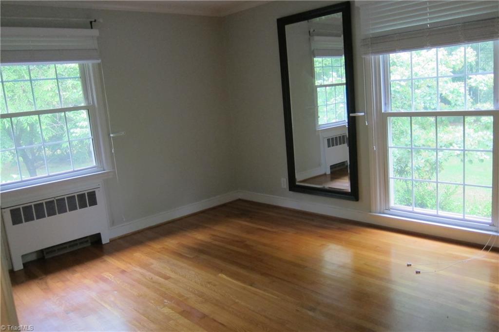 2419 Oak Ridge Road Oak Ridge, NC 27310 - Photo 11 of 30 Master Beroom with wood floors...good light...closet organizer.
