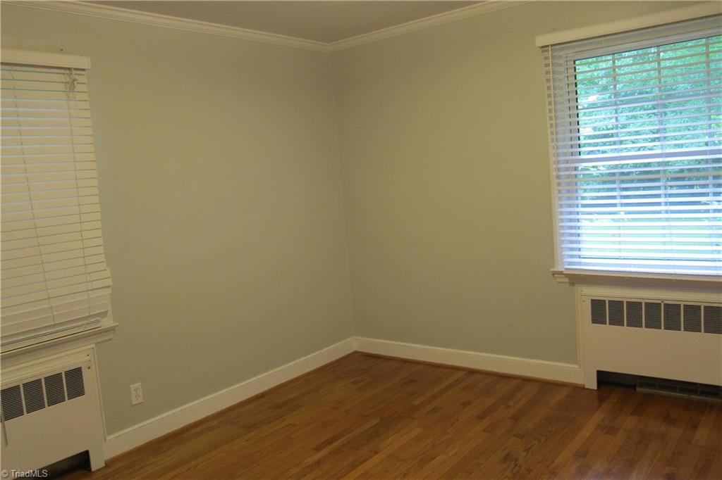 2419 Oak Ridge Road Oak Ridge, NC 27310 - Photo 13 of 30 Bedroom #2 with wood floors...good light.