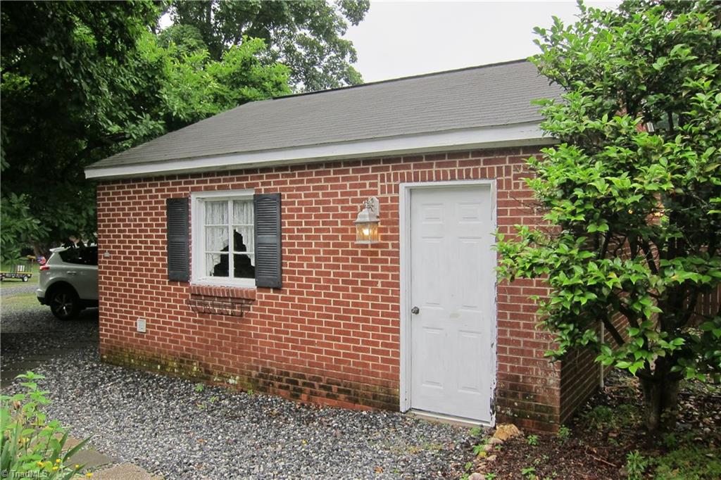 2419 Oak Ridge Road Oak Ridge, NC 27310 - Photo 27 of 30 1 car garage...Door leads to potting shed!