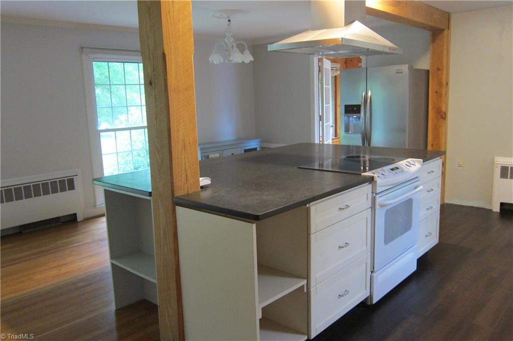 2419 Oak Ridge Road Oak Ridge, NC 27310 - Photo 6 of 30 Island with storage space...great for cook books or Large appliances.