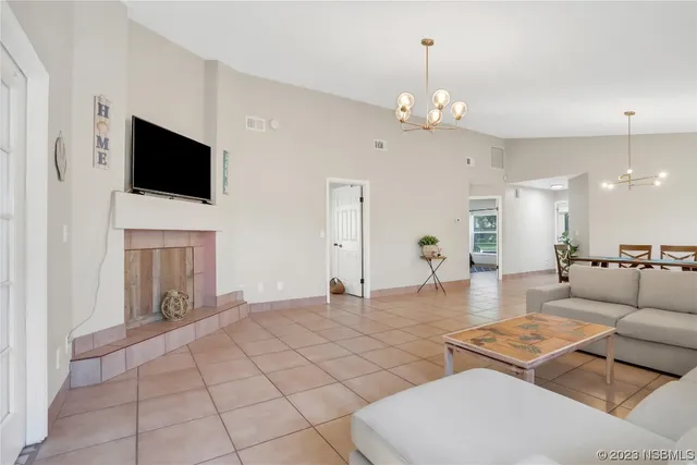 a view of a livingroom with furniture and window