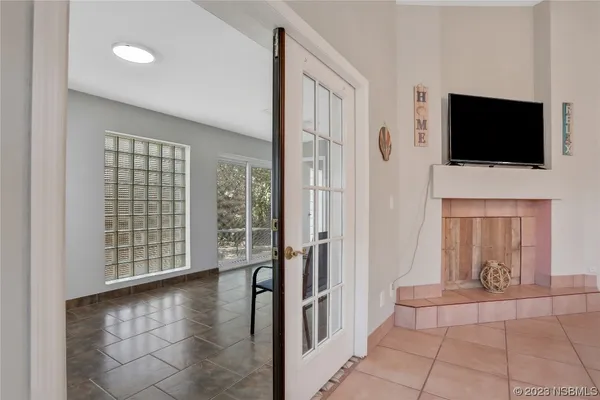 a view of a livingroom with furniture and windows
