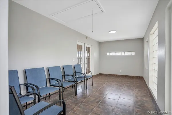 a bathroom with a sink a vanity and a mirror