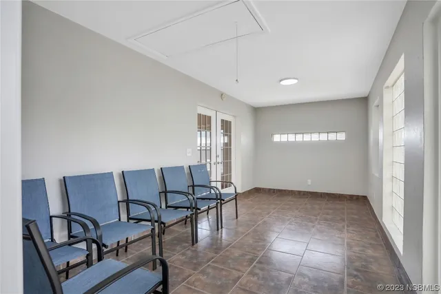 a bathroom with a sink a vanity and a mirror