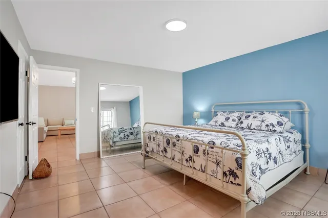a bathroom with a sink vanity mirror and toilet