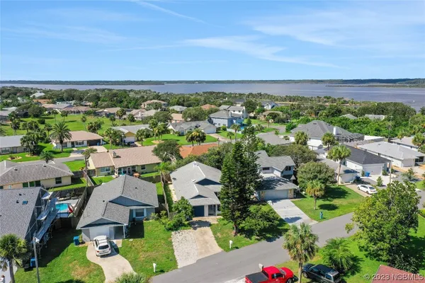 an aerial view of a city with lots of residential buildings
