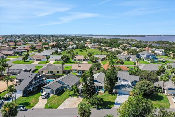 an aerial view of a city with lots of residential buildings