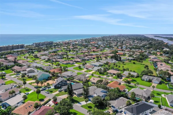 a view of an ocean with a city view
