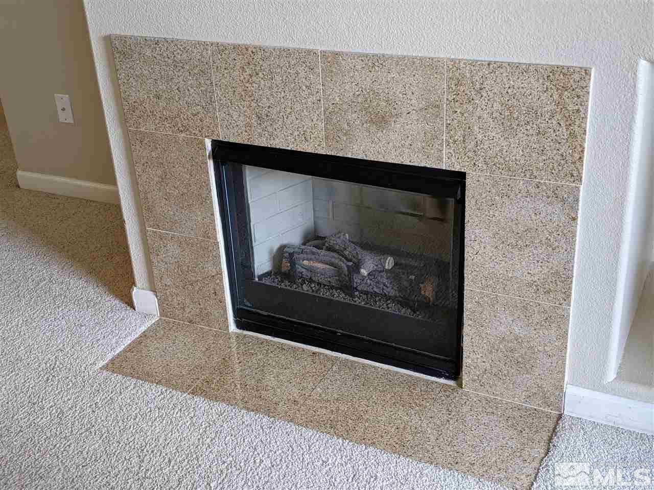900 South, Unit 2723 Reno, NV 89521 - Photo 3 of 14 a stone fireplace