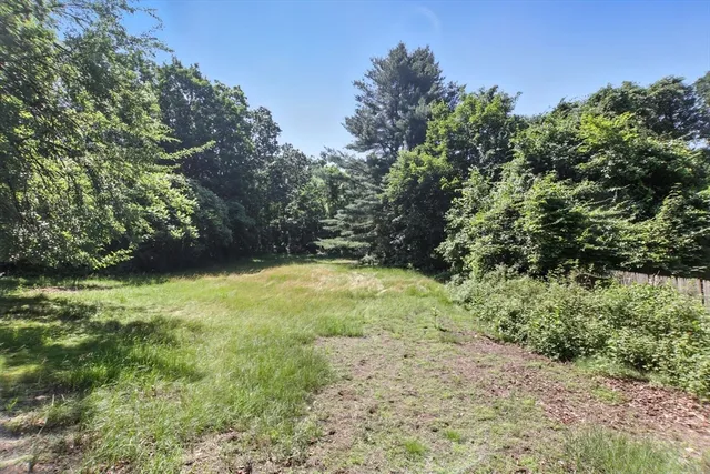 a picture of a bathroom with a sink and a mirror