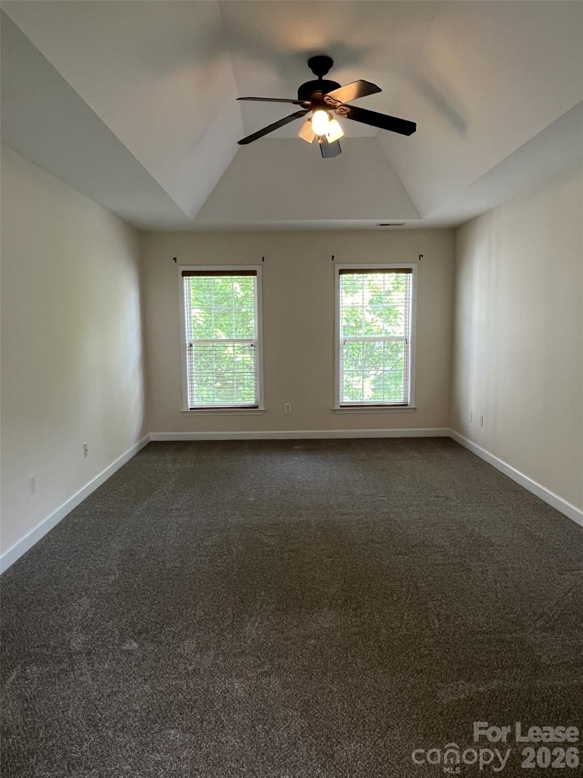 8531 Camberly Road Huntersville, NC 28078 - Photo 15 of 32 a view of room with a ceiling fan and window