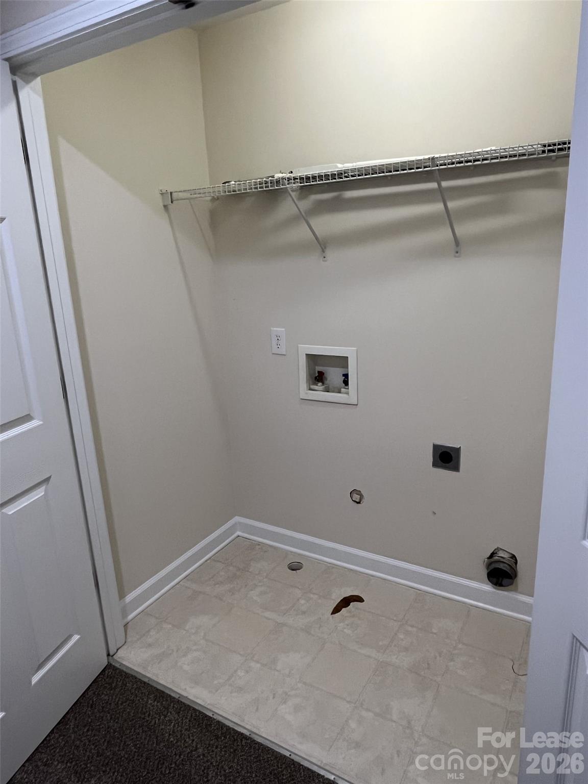 8531 Camberly Road Huntersville, NC 28078 - Photo 24 of 32 a view of a room with racks on the wall