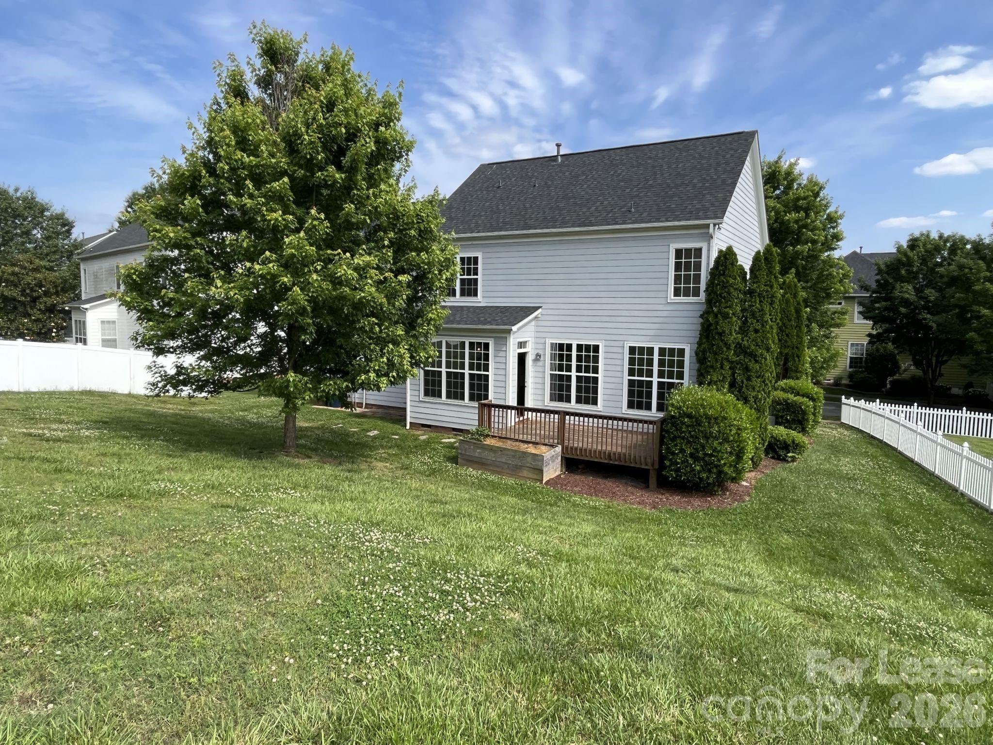 8531 Camberly Road Huntersville, NC 28078 - Photo 31 of 32 a view of a house with a yard