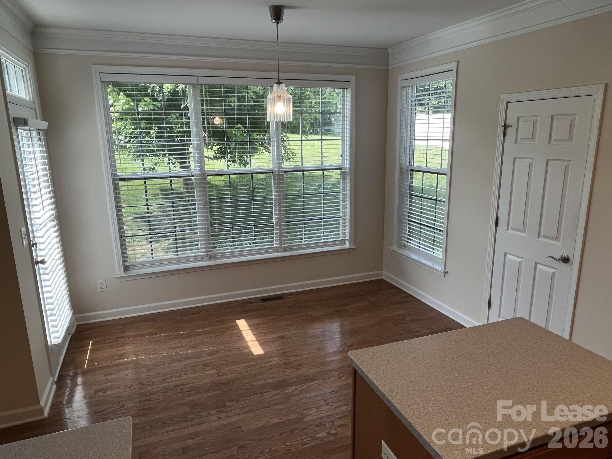 8531 Camberly Road Huntersville, NC 28078 - Photo 10 of 32 a view of a livingroom with furniture and window
