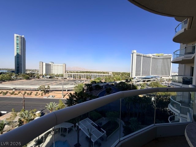 2777 Paradise Road, Unit 807 Las Vegas, NV 89109 - Photo 49 of 61 City lights beckon from this high-rise balcony, offering sweeping urban and mountain vistas.