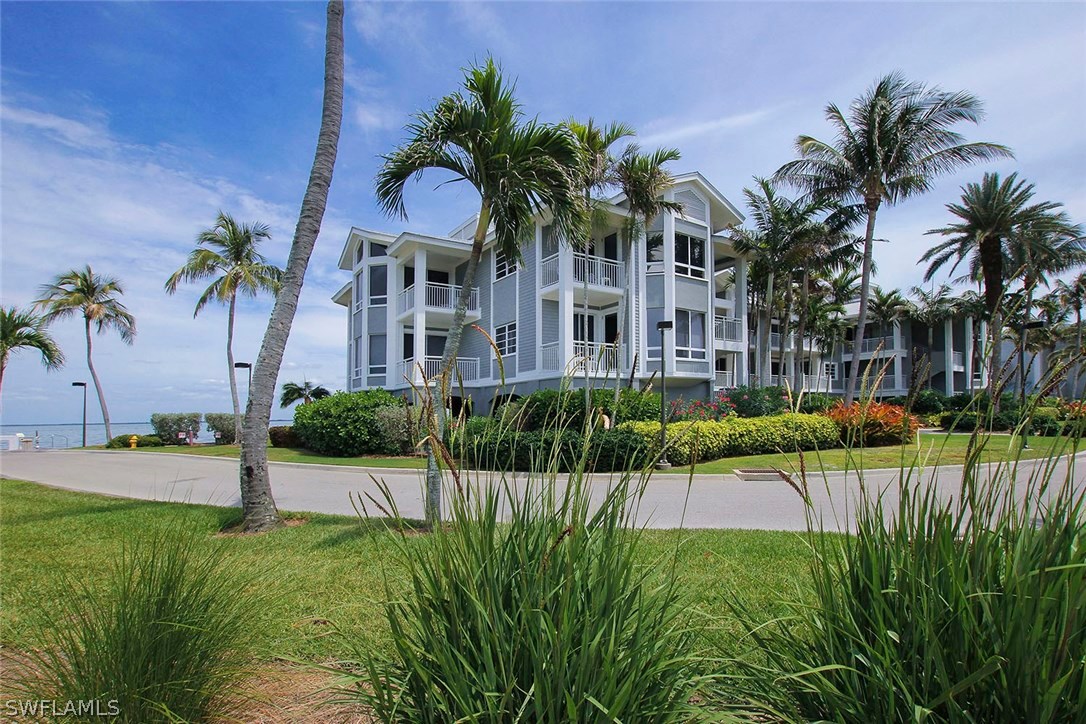 1251 South Seas Plantation Road Captiva, FL 33924 - Photo 1 of 24 a view of a house with a yard and potted plants