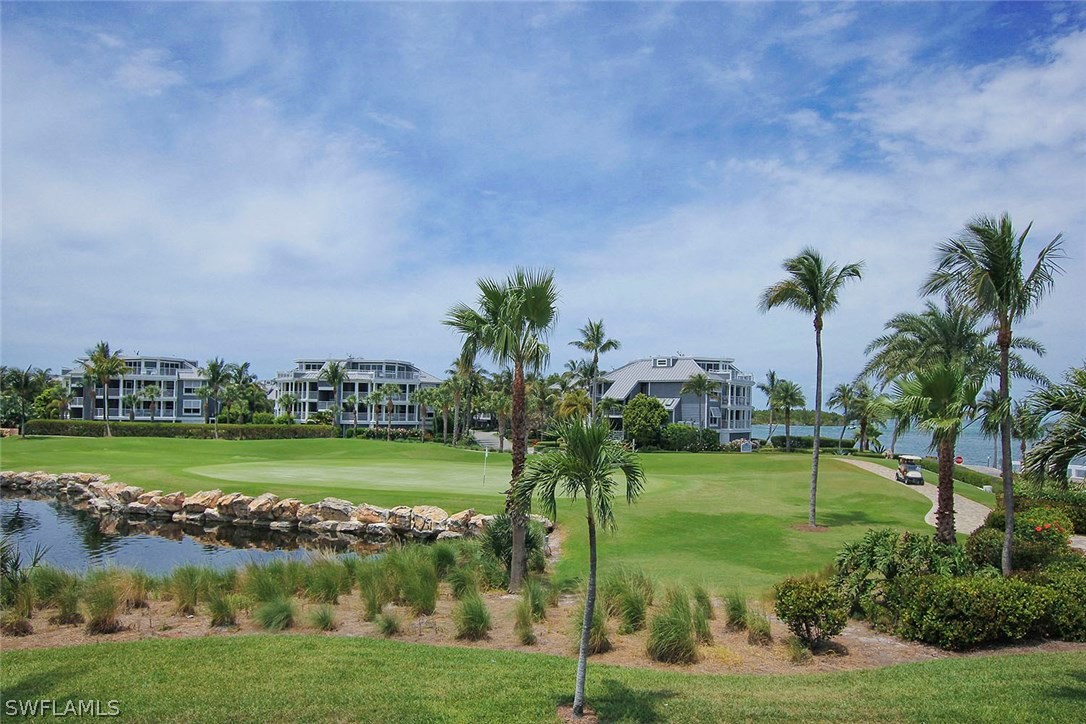 1251 South Seas Plantation Road Captiva, FL 33924 - Photo 22 of 24 a view of a golf course with a lake view