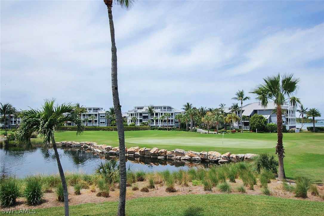 1251 South Seas Plantation Road Captiva, FL 33924 - Photo 24 of 24 a view of a lake with a big yard