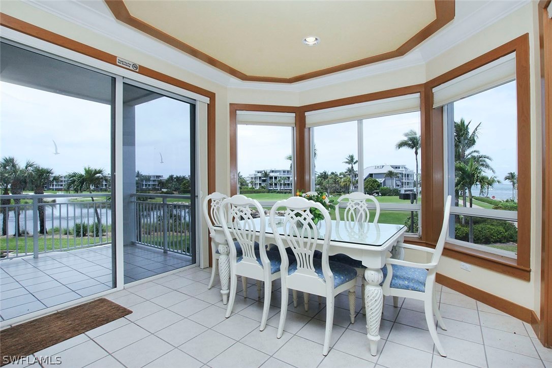 1251 South Seas Plantation Road Captiva, FL 33924 - Photo 8 of 24 a dining room with furniture water view and balcony view