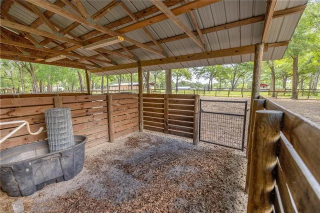 a view of a porch with wooden floor