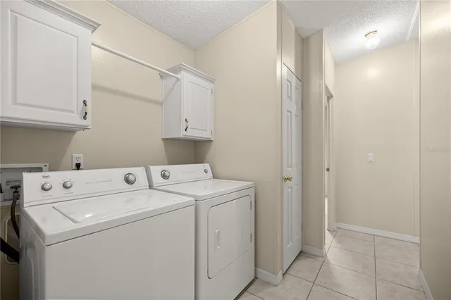a view of a chandelier fan in a room