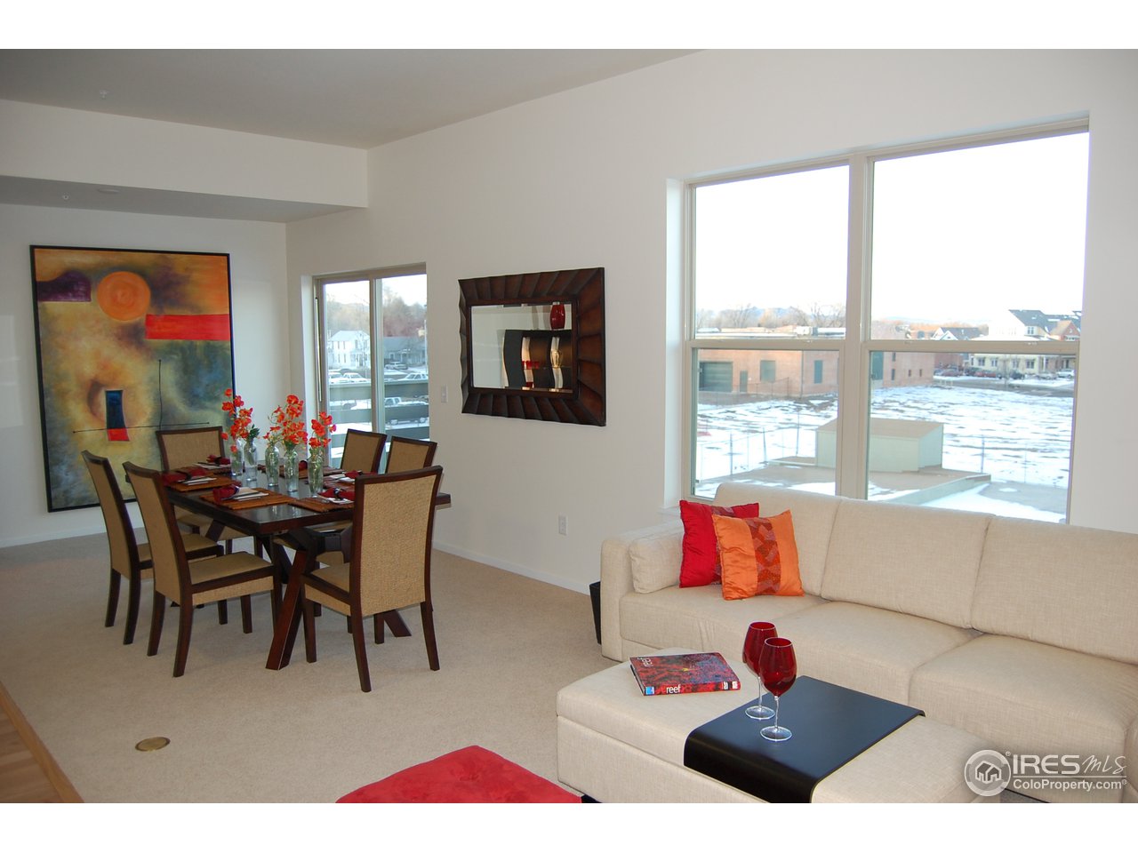 204 Maple Street, Unit 403 Fort Collins, CO 80521 - Photo 5 of 14 a living room with furniture and a large window