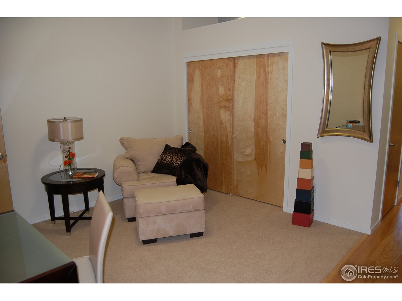 204 Maple Street, Unit 403 Fort Collins, CO 80521 - Photo 9 of 14 a living room with furniture and a window