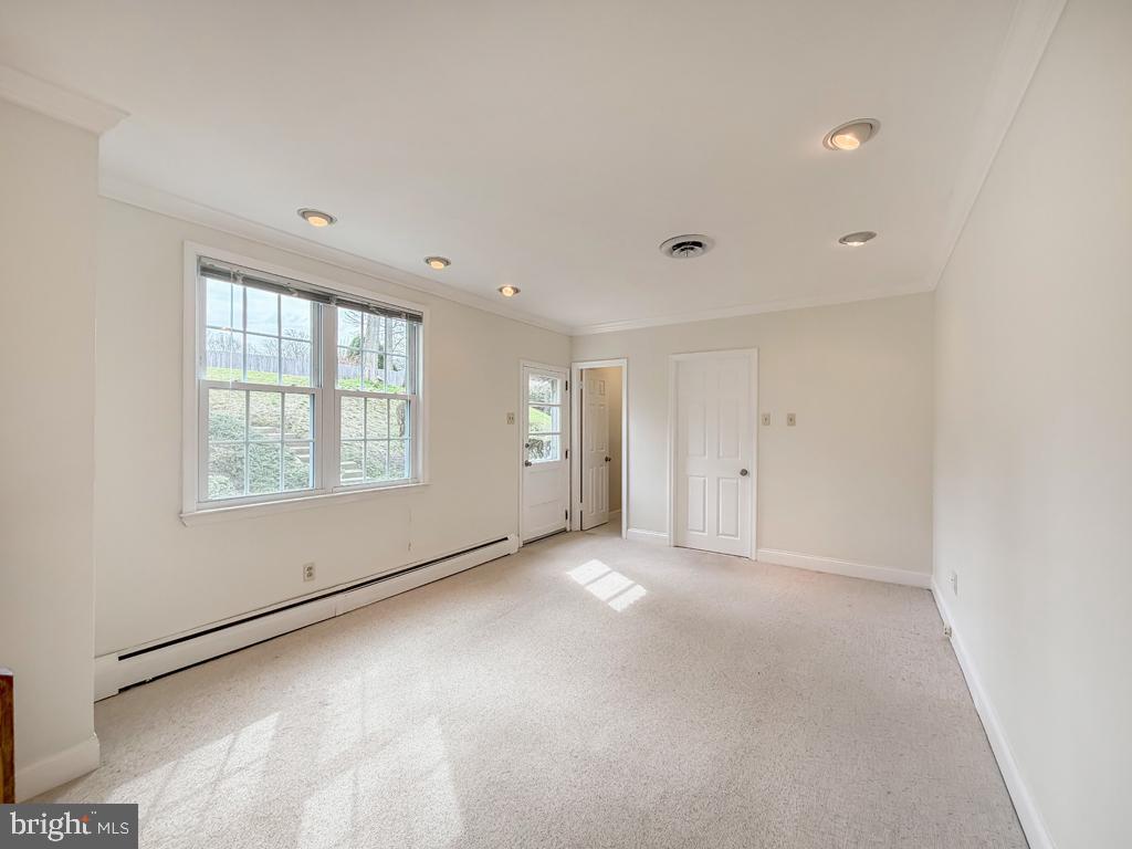 221 Foxcroft Road Broomall, PA 19008 - Photo 19 of 67 Family Room with door to patio and backyard