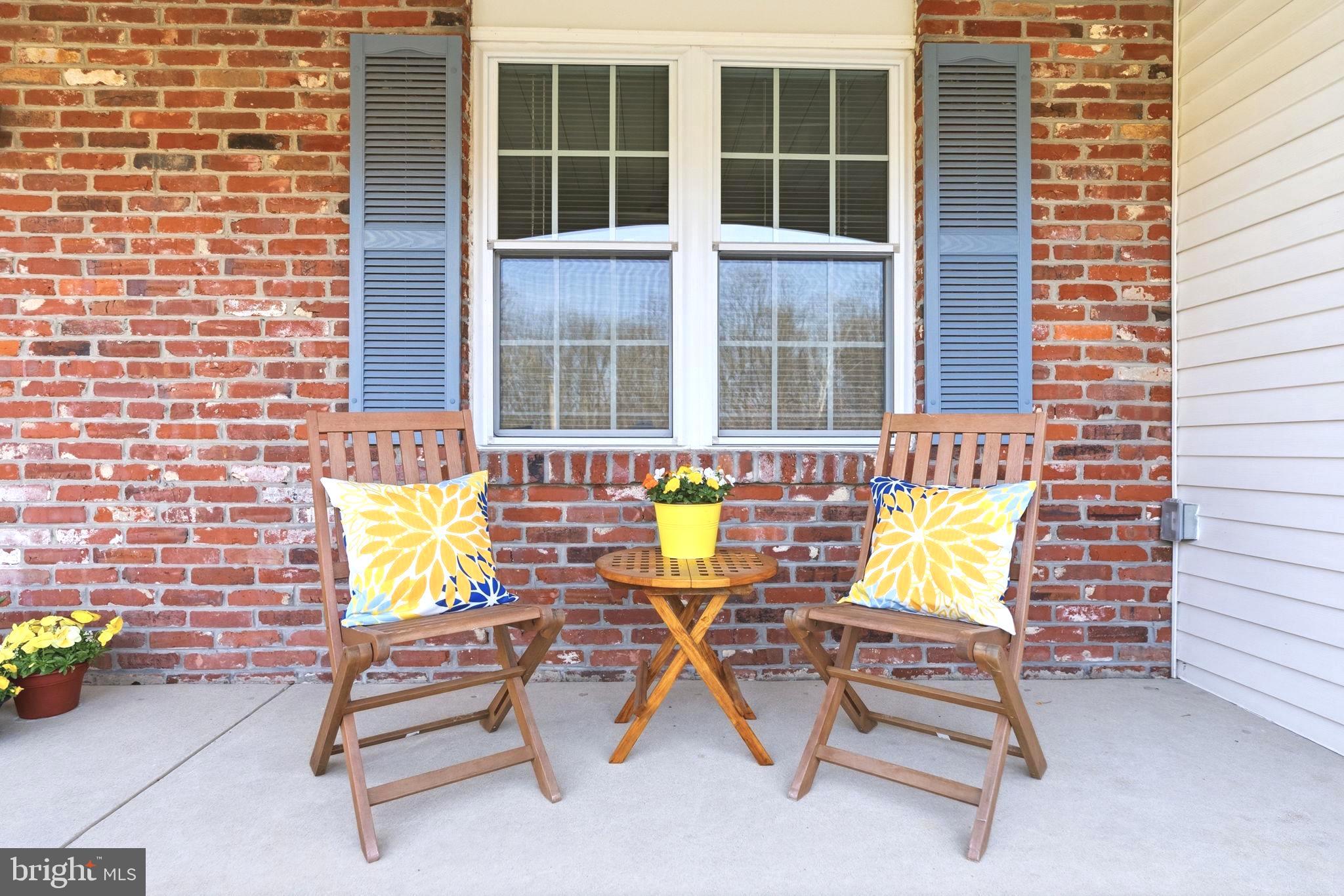 221 Foxcroft Road Broomall, PA 19008 - Photo 5 of 67 Charming porch seating area with brick detail