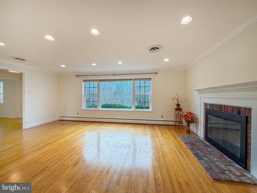221 Foxcroft Road Broomall, PA 19008 - Photo 9 of 67 Living room with classic fireplace feature