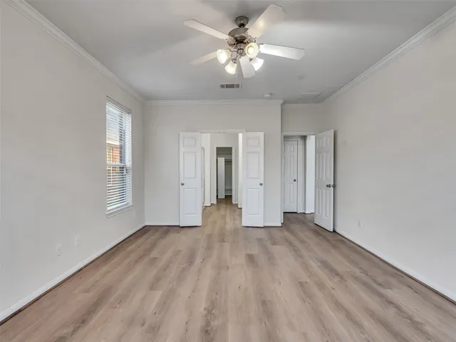 a view of an empty room with window